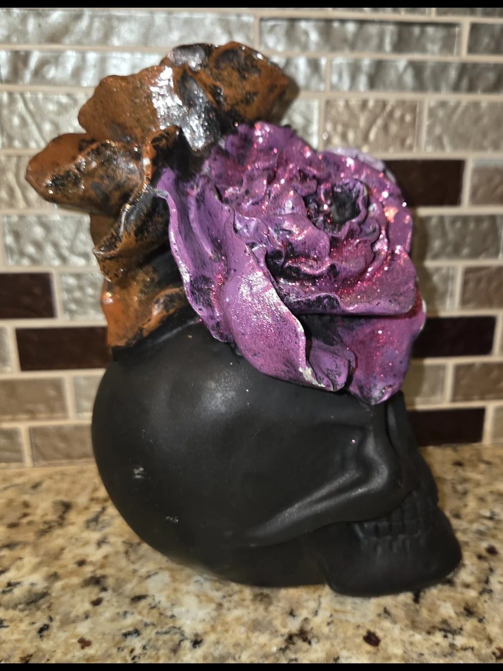 Black Resin Decorative Halloween Skull with Purple Lavender & Orange Flowers
